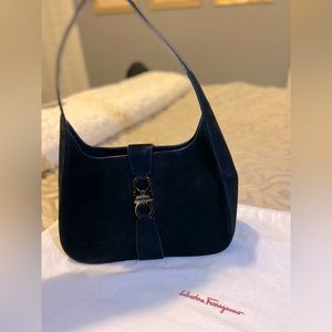 Salvatore Ferragamo purse. It has never been used.